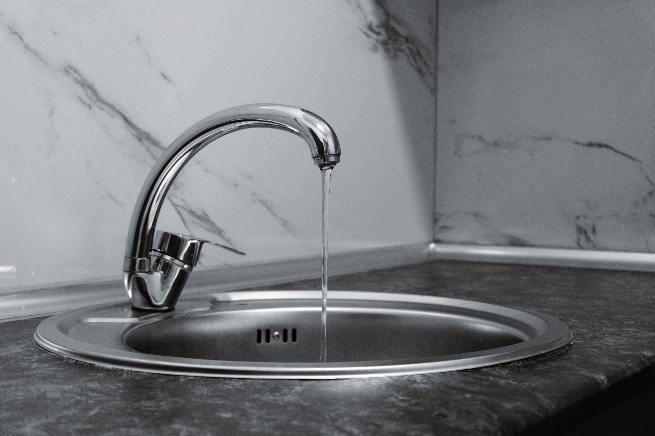 Clean water running from a kitchen faucet